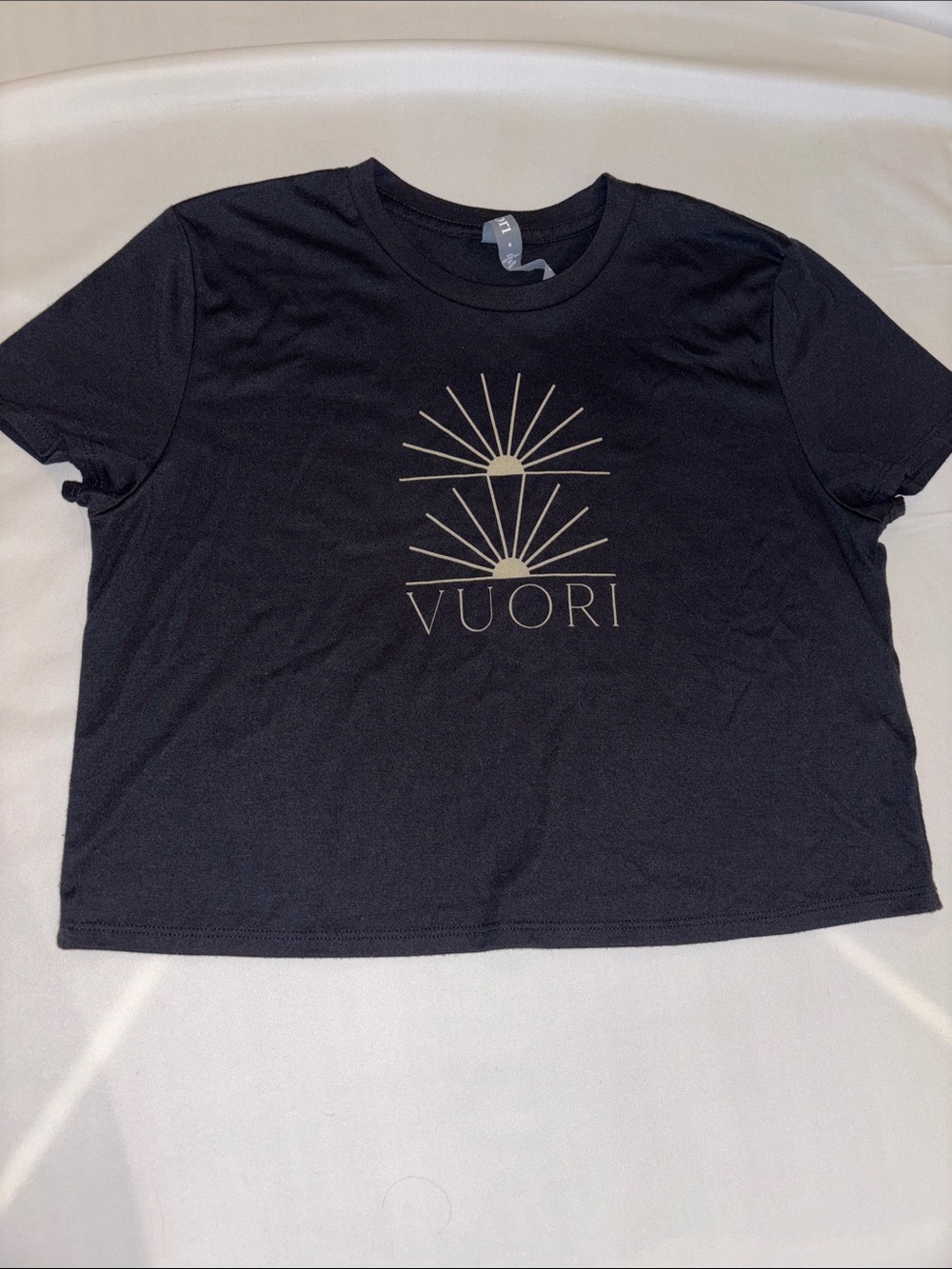 Vuori Black Short-Sleeve Graphic Tee with Gold Sunburst